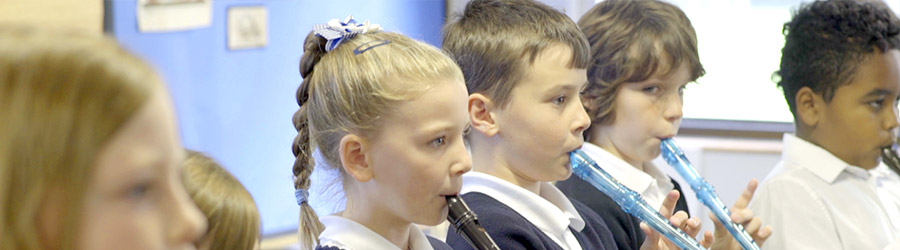 Children playing recorder